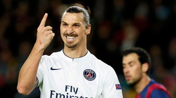 Paris St Germain's Zlatan Ibrahimovic gestures during their Champions League Group F soccer match against Barcelona at the Nou Camp stadium in Barcelona, December 10, 2014. REUTERS/Albert Gea (SPAIN - Tags: SPORT SOCCER TPX IMAGES OF THE DAY)